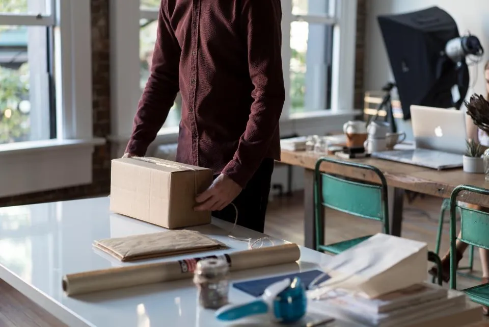 Merchant packing an order